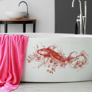 Detail of red koi and cherry blossom self-adhesive stickers applied on a white bathtub