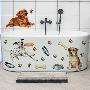 Détail de stickers chiots aquarelle appliqués sur une baignoire et un mur en carrelage blanc
