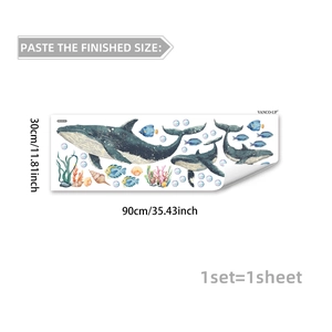 Detail view of marine wall sticker layout featuring blue whales and colorful sea creatures