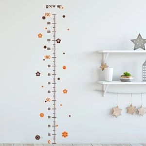 Detail van de bloemen groeimeter muursticker tot 150 cm op een witte achtergrond