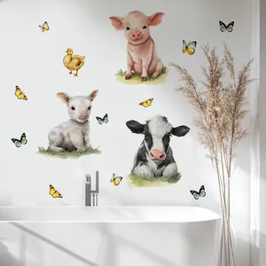 Nursery wall stickers featuring watercolor farm animals above a modern bathtub