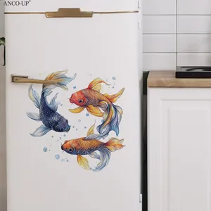 Detailed close-up of watercolor koi fish wall decals applied on a white kitchen fridge