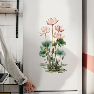 Detail of pink lotus flower and green leaves wall sticker on white refrigerator surface
