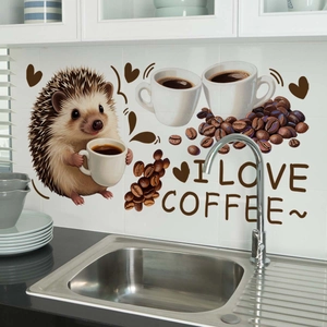 Detail of cartoon hedgehog kitchen wall decal with I Love Coffee slogan on white tiles