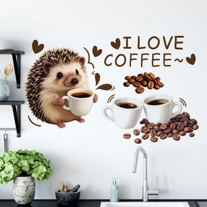 Detail of cute hedgehog and coffee slogan wall sticker on a white kitchen background