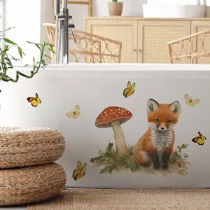 Detail of waterproof watercolor fox, mushroom, and butterflies wall stickers on a bathtub