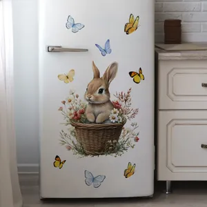 Watercolor wall sticker detail of a cute rabbit in a flower basket on a white fridge