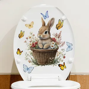 Close-up of a cute rabbit and floral illustration on a white self-adhesive toilet lid cover