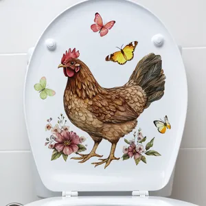 Detail of floral rooster and butterfly adhesive wall sticker on a white toilet lid