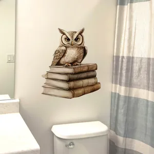 Detailed wall sticker featuring a realistic owl perched on vintage books in a bathroom setting