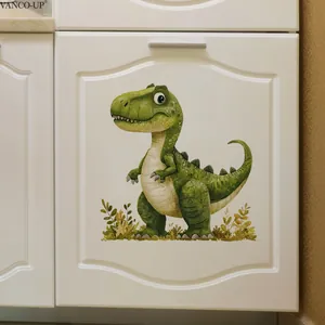 Close-up of cute green dinosaur self-adhesive wall sticker on white kitchen cabinet