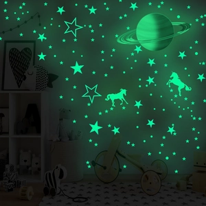 Luminous wall stickers set featuring glowing stars and unicorns for children bedroom decor