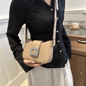 Beige shoulder bag for women featuring a crystal square buckle and adjustable strap