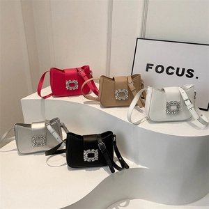 Minimalist baguette shoulder bags in five colors with iconic crystal-embellished square buckle