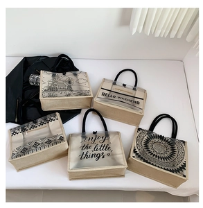Detail of five PVC tote bags with floral prints, hemp base and black handles