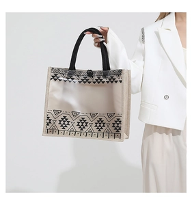Side view of tote bag showing transparent PVC geometric pattern and linen side panels