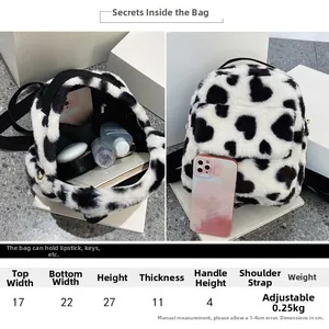 Size specifications and capacity detail of cute cow print plush backpack with dimensions