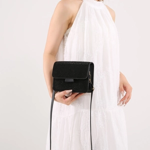 Elegant black rhinestone crossbody bag for women with sleek shoulder strap and flap closure