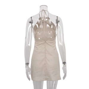 Detail view of backless linen dress with halter neck ties and invisible zipper closure