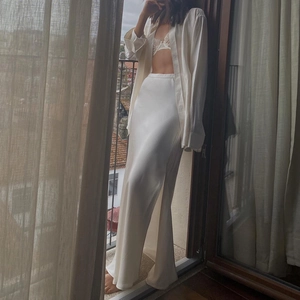 Elegant white satin high waist maxi skirt set with side slit and long sleeve shirt