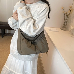 Olive brown high-density nylon crossbody bag with drawstring closure in casual style