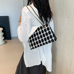 Retro black and white houndstooth wool shoulder bag with metal chain strap