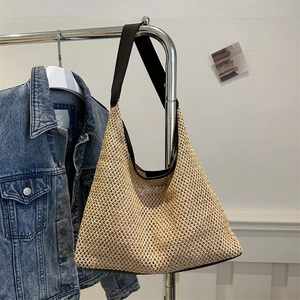 Large woven hobo shoulder bag with brown leather strap for summer beach or daily commute
