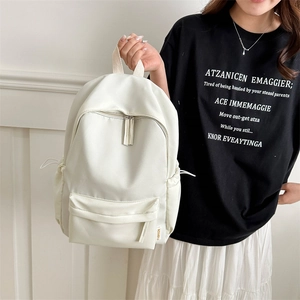 Minimalist beige nylon backpack with large capacity and drawstring side pockets