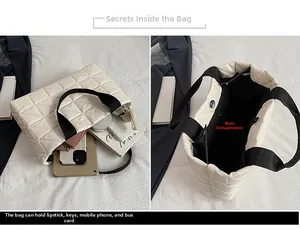 Macro detail of large capacity quilted tote bag showing interior storage for electronics
