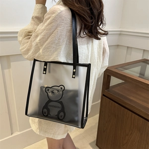 Modern clear PVC tote bag with black bear print and internal pouch for women