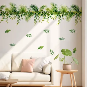 Detail of watercolor green vine wall stickers showing leaf texture on living room wall