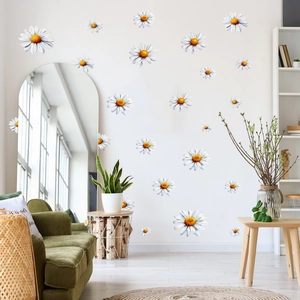 Detailed view of white daisy wall stickers on a modern living room background