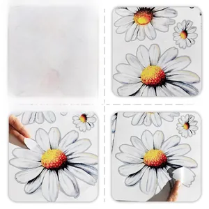 Close-up showing the easy-to-peel adhesive backing of white daisy flower wall decals