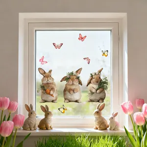 Detailed view of Easter bunny window stickers and butterflies on a glass pane decor