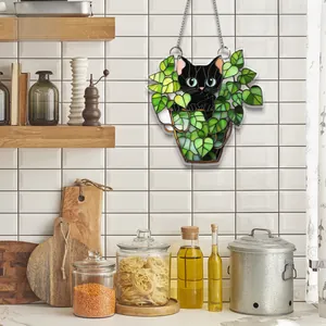 Panneau décoratif 2D avec chat noir et plantes vertes suspendu dans une cuisine moderne
