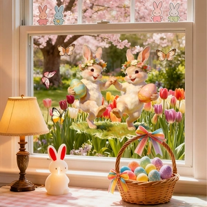 Detailed view of Easter bunny window stickers on glass with tulip garden background
