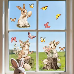 Detailed Easter window decals featuring realistic rabbits, colorful butterflies, and flowers