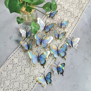 3D blue gold-edged butterfly wall stickers set on elegant marble table for home decor