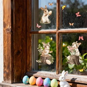 Easter window clings showing cute bunnies and colorful butterflies on glass pane