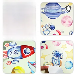 Detailed view of waterproof watercolor space stickers with astronaut and planet patterns