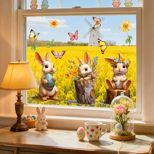 Easter window decals featuring cute cartoon bunnies and colorful eggs on a bright glass pane
