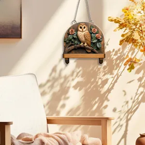 Détail du pendentif hibou 2D avec effet 3D et base florale pour décoration murale