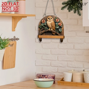 Pendentif chouette plat en 2D avec fleurs roses et chaîne argentée sur mur blanc