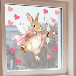 Detail of pink Cupid bunny window sticker with glowing heart arrow on glass pane