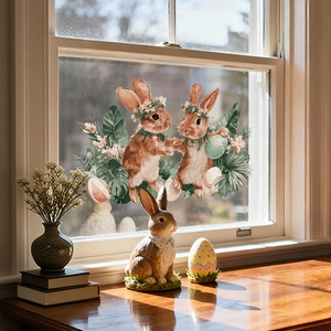 Detailed Easter window decals featuring brown bunnies with floral wreaths and eggs