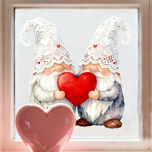Detail of Valentine gnomes window stickers with heart patterns on a white window frame