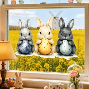 Detailed watercolor Easter static window clings featuring bunnies holding colorful eggs