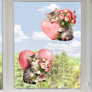 Detail of watercolor cat window stickers with pink hearts on a clear glass pane