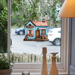 Detailed view of 2D flat acrylic blue cottage hanging decor with silver metal chain