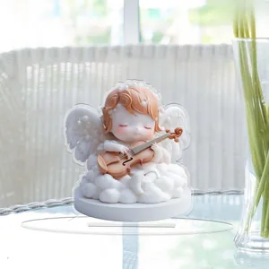 Detail of 2D acrylic angel holding violin on a cloud with clear round stand base